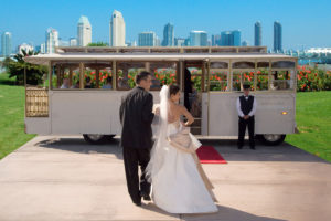 Newlyweds boarding Old Town Trolley's Wedding Charter
