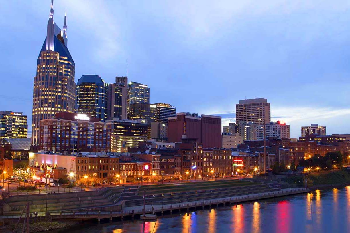 View of Nashville city skyline and river at night