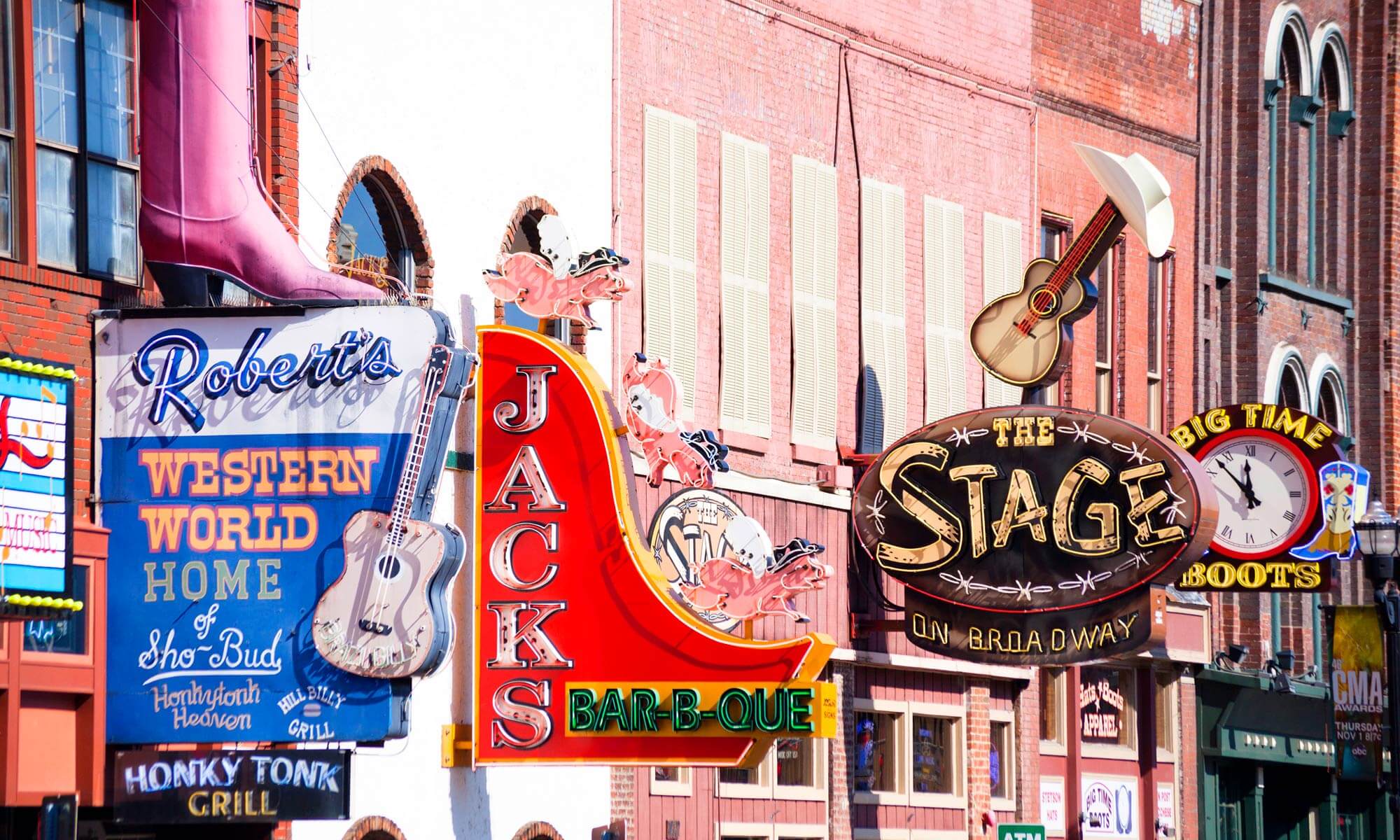 Various neon signs for the venues along Lower Broadway in Nashville, TN