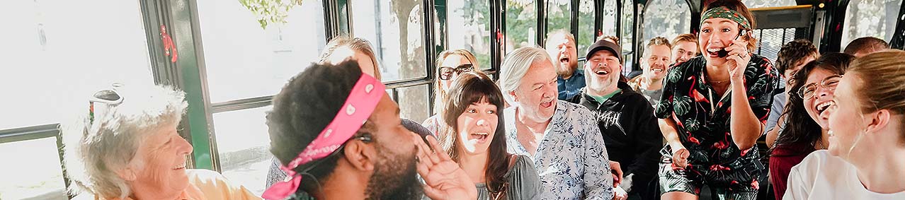 Savannah for Morons hosts and guests inside trolley