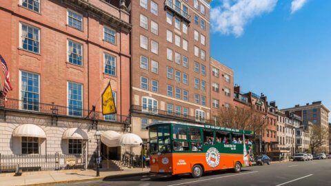 Old Town Trolley outside the famous Cheers bar in Boston, MA