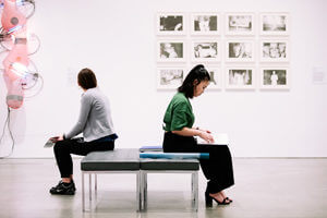 Visitors sitting on benches at Boston Institute of Contemporary Art