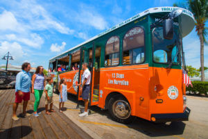 visitors boarding old town trolley key west