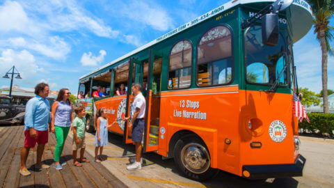 visitors boarding old town trolley key west