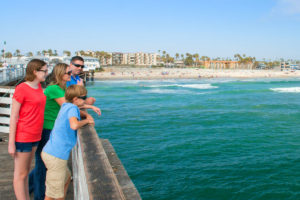 Family overlooking the ocean in La Jolla