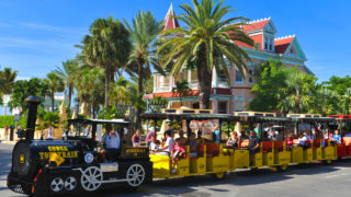 key west conch tour train driving past southernmost hotel