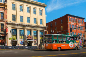 old town trolley nashville vehicle in front of broadway national bank