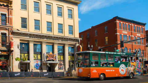 old town trolley nashville vehicle in front of broadway national bank