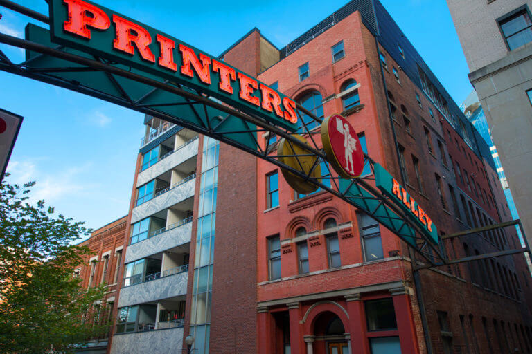 upward view of nashville printers alley street sign