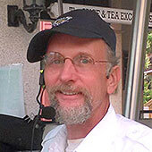 Picture of a Old Town Trolley Tour guide with glasses, a goatee and a blue baseball cap in St. Augustine, FL