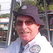 Picture of an Old Town Trolley Tour guide with glasses, a goatee and a floppy hat in St. Augustine, FL