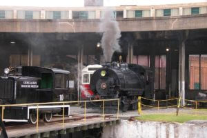 train blowing steam at savannah roundhouse railroad museum