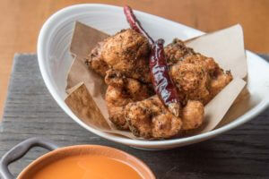 picture of pepper on top of food at chauhan ale and masala house restaurant in nashville