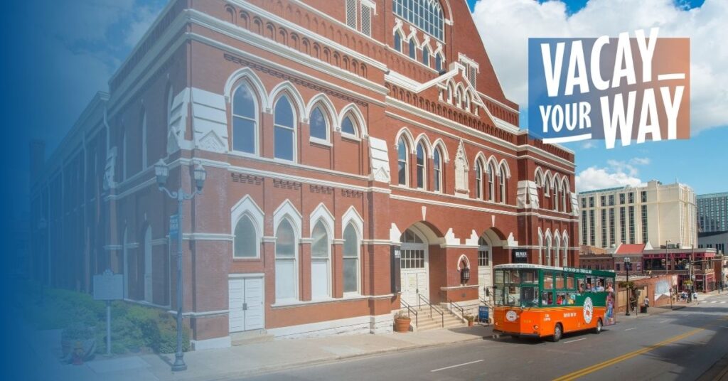 Nashville Vacay Your Way and trolley driving past Ryman Auditorium 