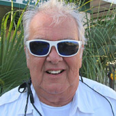 Image of male Old Town Trolley Tours cast member wearing sun glasses