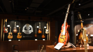 guitars hanging on wall at the gig gallery in nashville