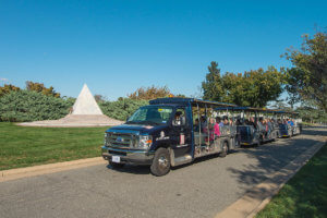 picture of arlington national cemetery tours vehicle driving past us coast guard memorial