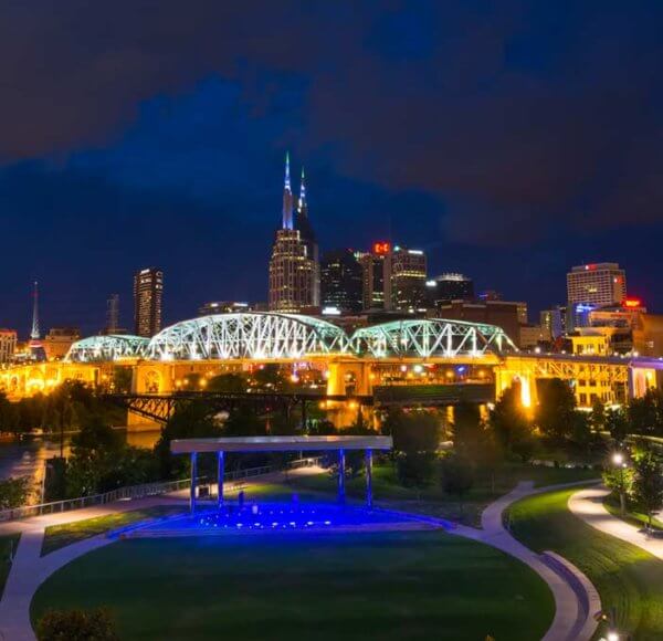 Nashville skyline over the bridge at night