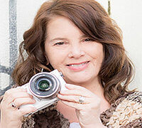 picture of Savannah cast member wendy holding a camera