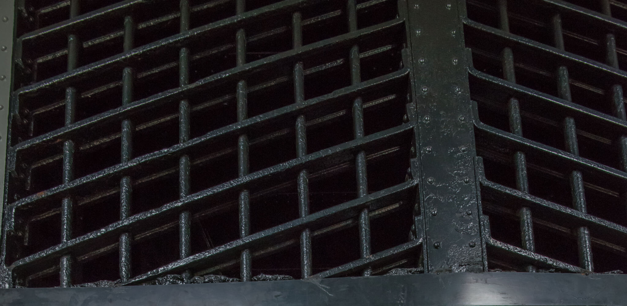 close up view of old jail metal bars