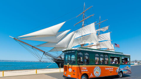 picture of san diego trolley in front of star of india tall ship