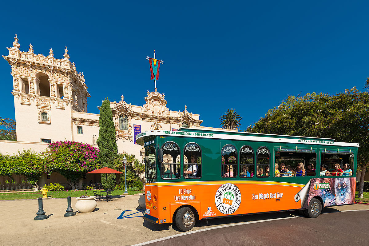 picture of san diego trolley in front of balboa park house of hospitality