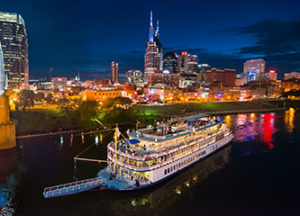 aerial view of nashville riverboat lit up at night