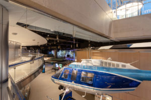 national law enforcement museum exhibit featuring a helicopter hanging from the ceiling with the words 'US Park Police' painted on the side of helicopter 