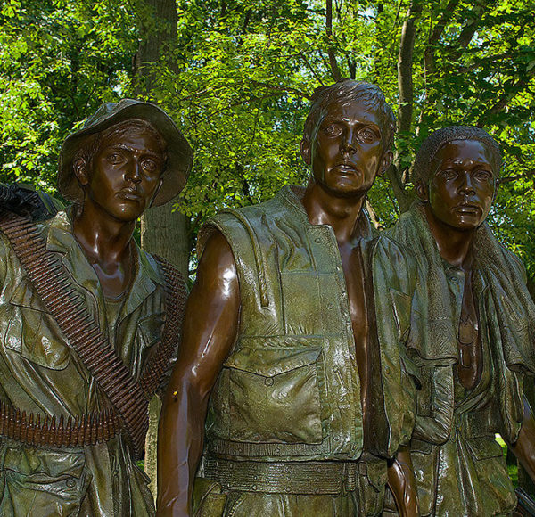 Three bronze status of US soldiers at Vietnam War Memorial in Washington DC