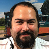 portrait of St. Augustine trolley conductor samuel