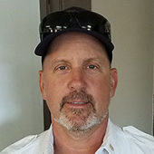 portrait of St. Augustine trolley conductor troy