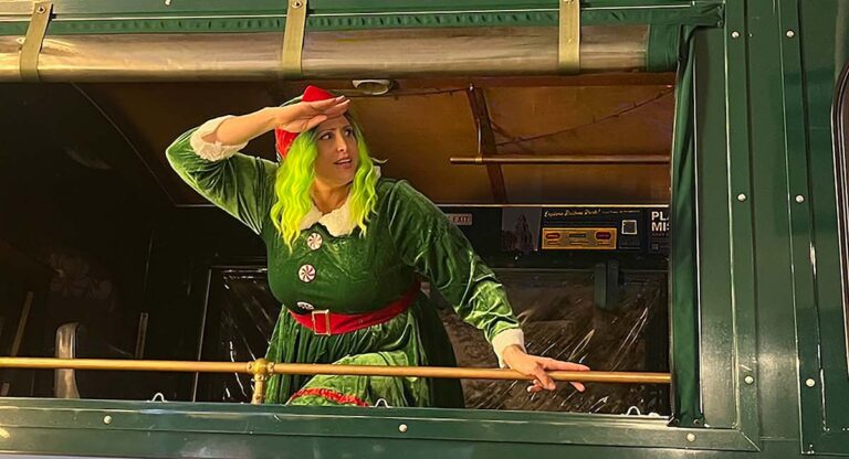 San Diego holiday tour elf host looking out the trolley window