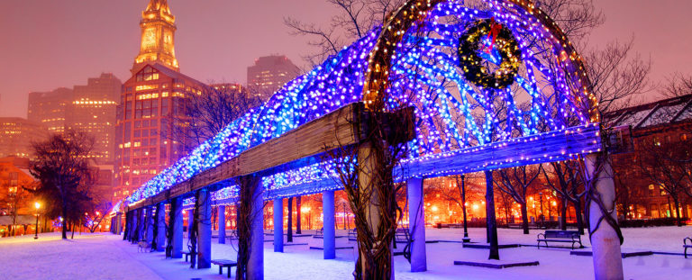 nighttime picture of a trellis with Christmas lights in Boston