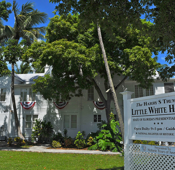 Exterior of Truman Little White House with a sign that reads 'The Harry S Truman Little White House'
