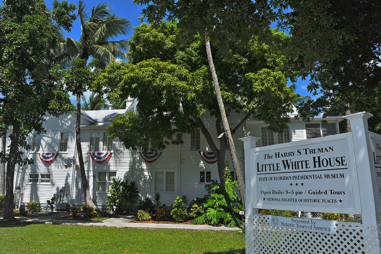 Exterior of Truman Little White House with a sign that reads 'The Harry S Truman Little White House'