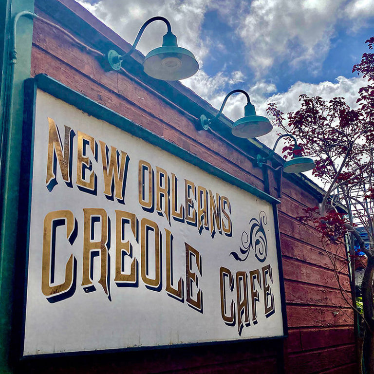 Sign that reads New Orleans Creole Cafe