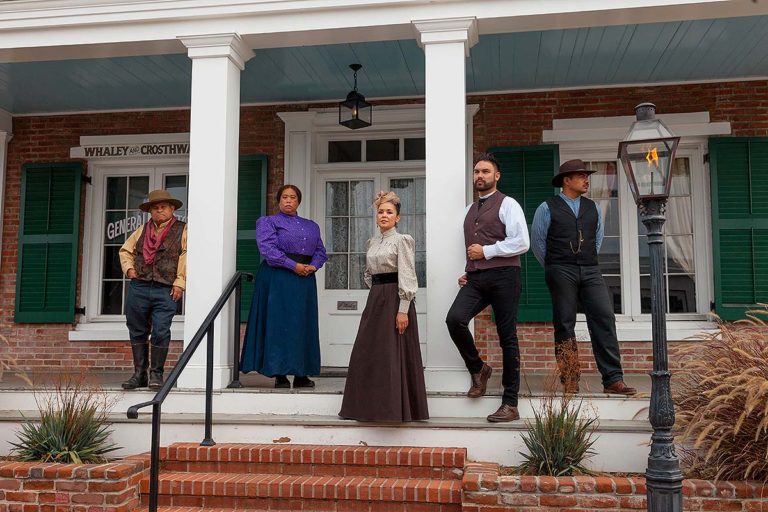 Whaley House cast members standing outside house