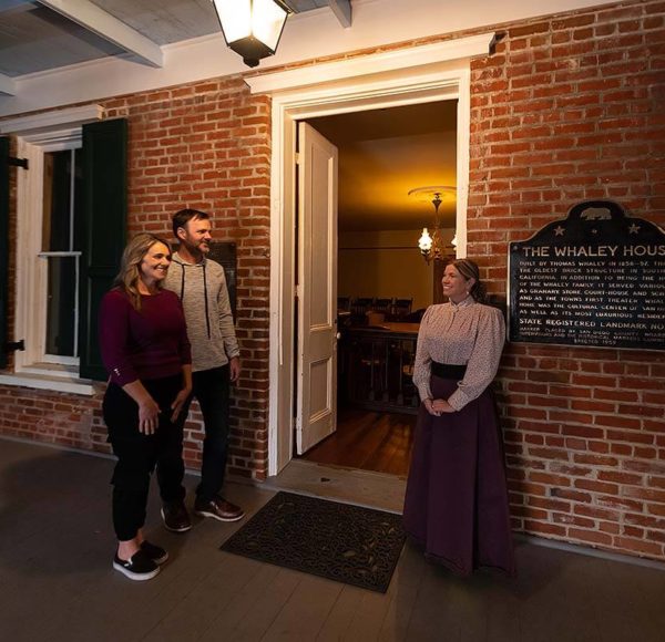 Whaley House guests entering house during the evening