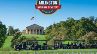 Arlington National Cemetery Tours – General Admission - Arlington Tours vehicle driving past Arlington House and official tour company seal