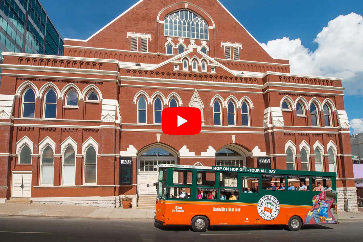 old town trolley tour vehicle in front of ryman auditorium in nashville 2