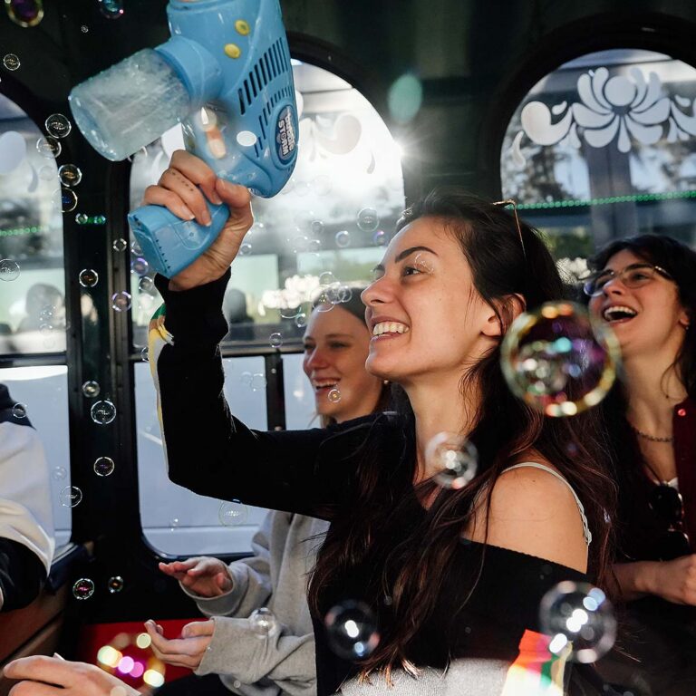 Savannah for Morons tour guest holding a bubble gun