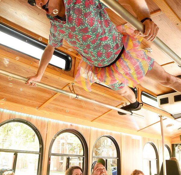 Savannah for Morons tour guide stuck to trolley ceiling