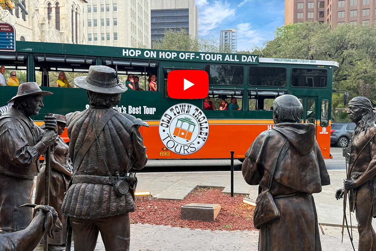 San Antonio trolley driving past Founders Monument