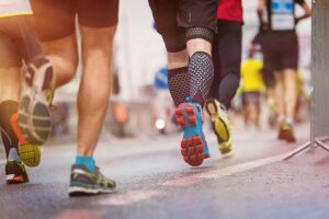 The Trick or Trot 5K in Savannah, featuring runners in costumes enjoying a festive atmosphere