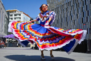 Colorful parade at Fiesta San Antonio, showcasing vibrant floats