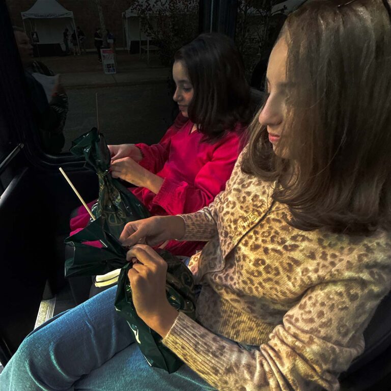 kids opening Charleston holiday tour gift