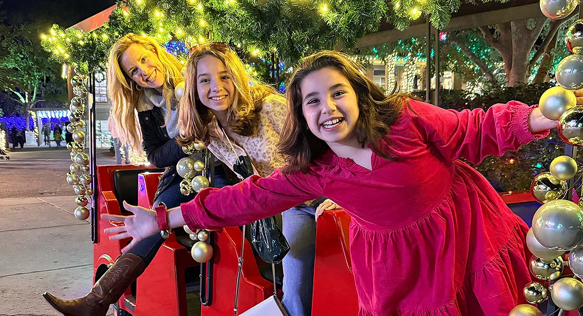 family at Savannah festival of lights train