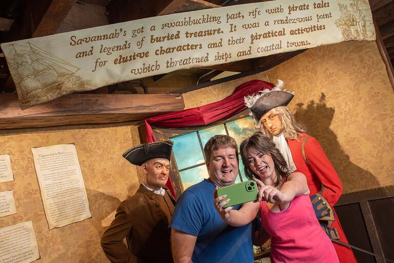guests taking pictures in front of exhibit at Savannah Pirates and Treasure Museum