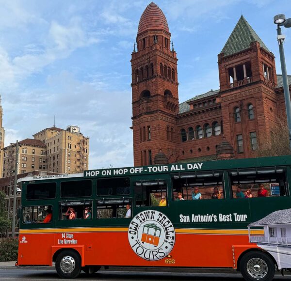 San Antonio trolley driving past Bexar Courthouse