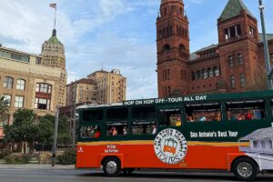 San Antonio trolley driving past Bexar Courthouse